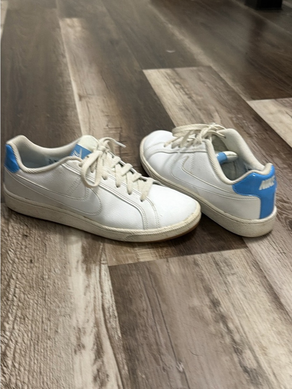 Nike White Sneakers with Light Blue Accents
